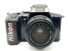 Nikon F-401x + Sigma 70-210mm